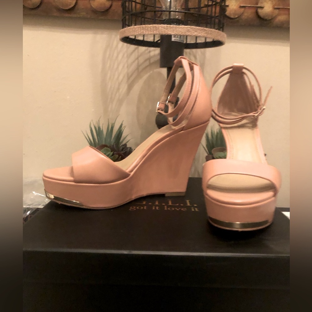 Wedge heeled sandals; apricot with gold detail around the front. Worn once.